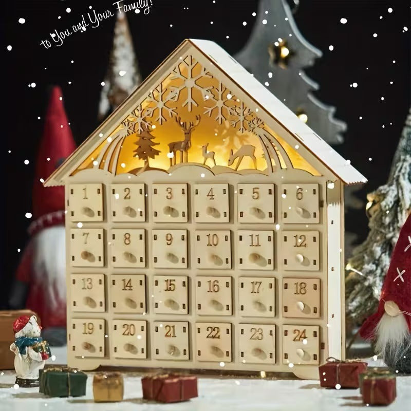 Illuminated wooden Advent calendar in cabin design