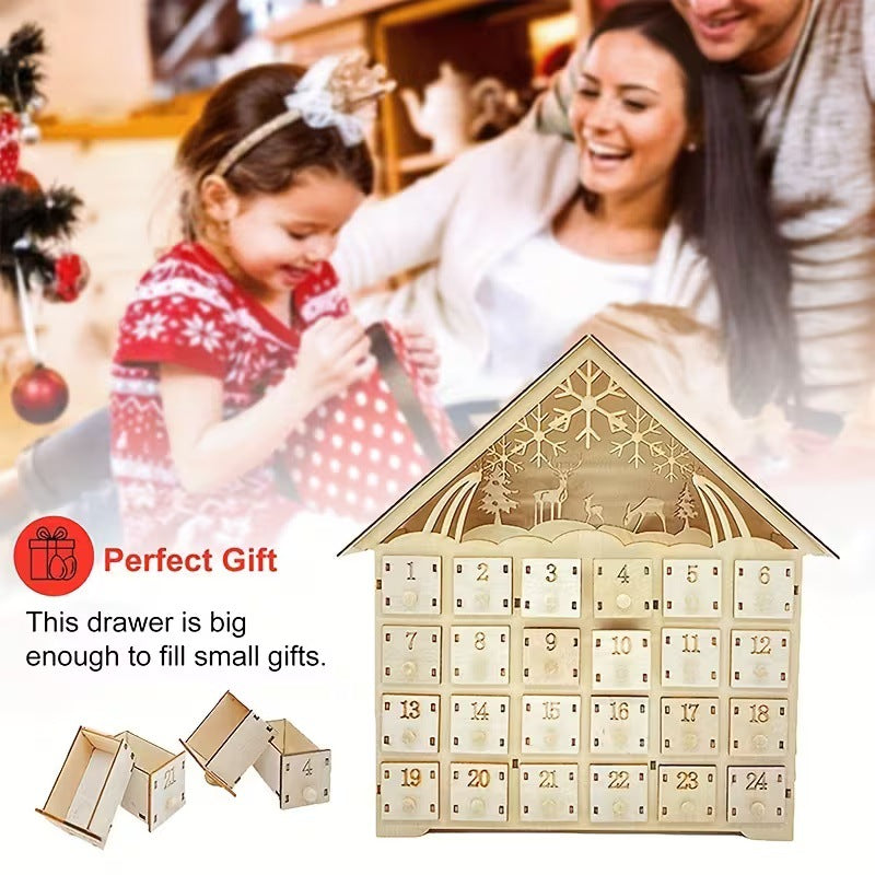 Illuminated wooden Advent calendar in cabin design